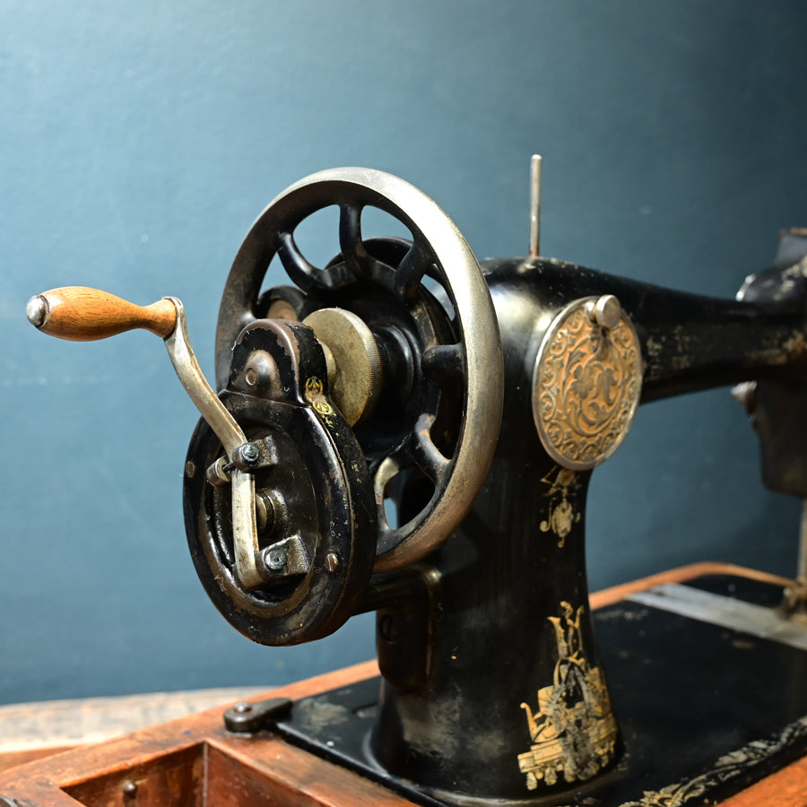 Máquina de coser Singer 128