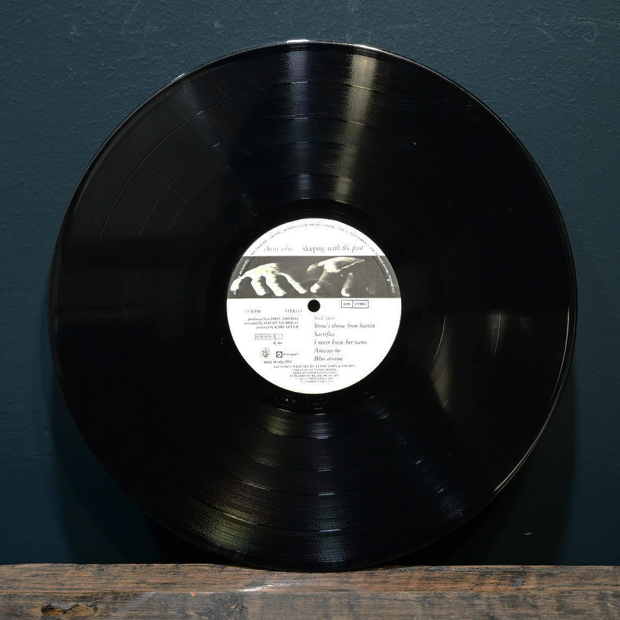 Long Play "Sleeping wih the Past" de Elton John edición neerlandesa 1989