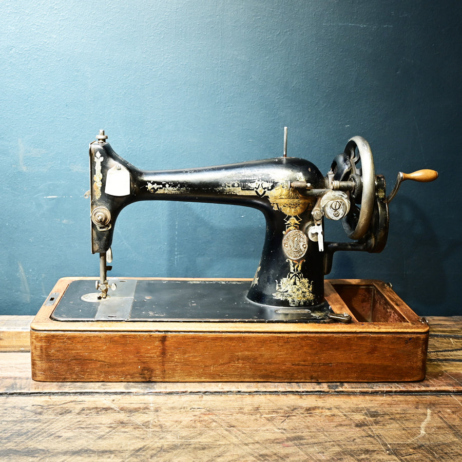 Máquina de coser Singer 128