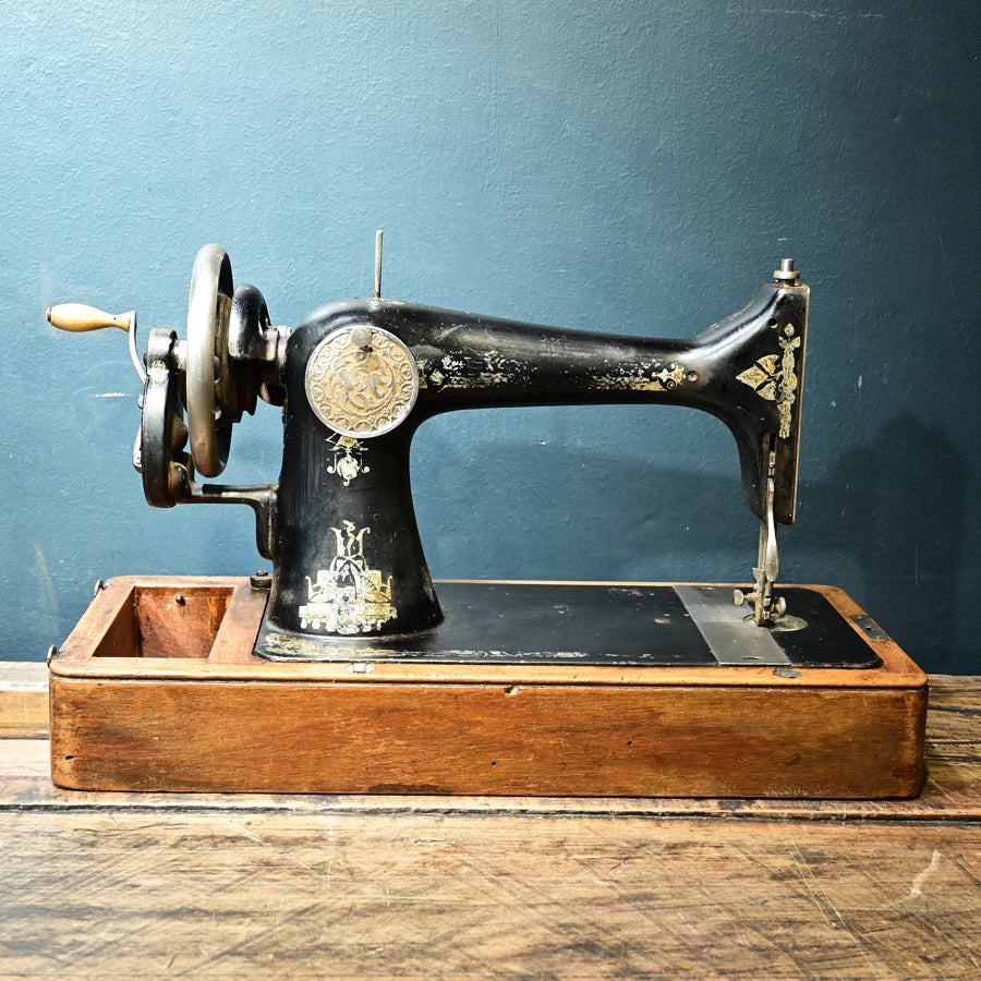 Máquina de coser Singer 128